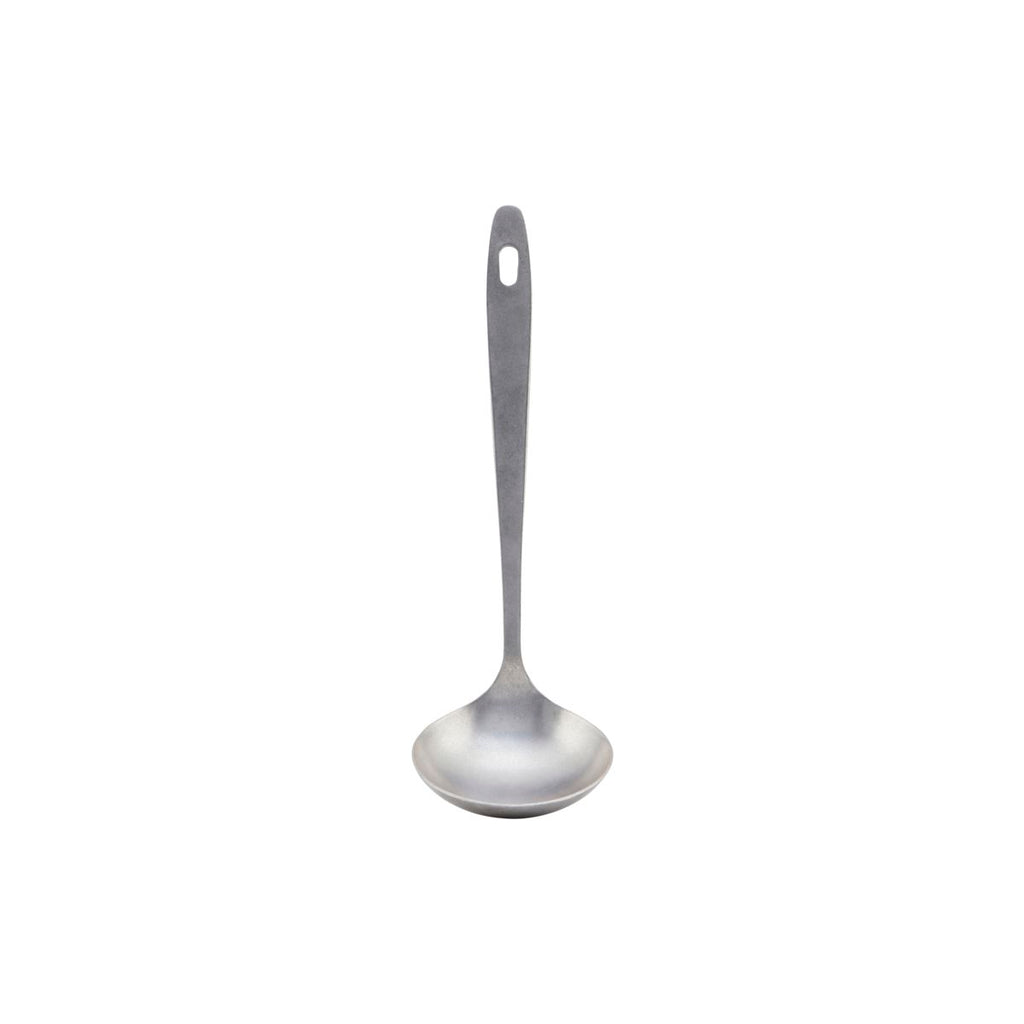A steel soup ladle with a hole at the top of the handle to hang it up.