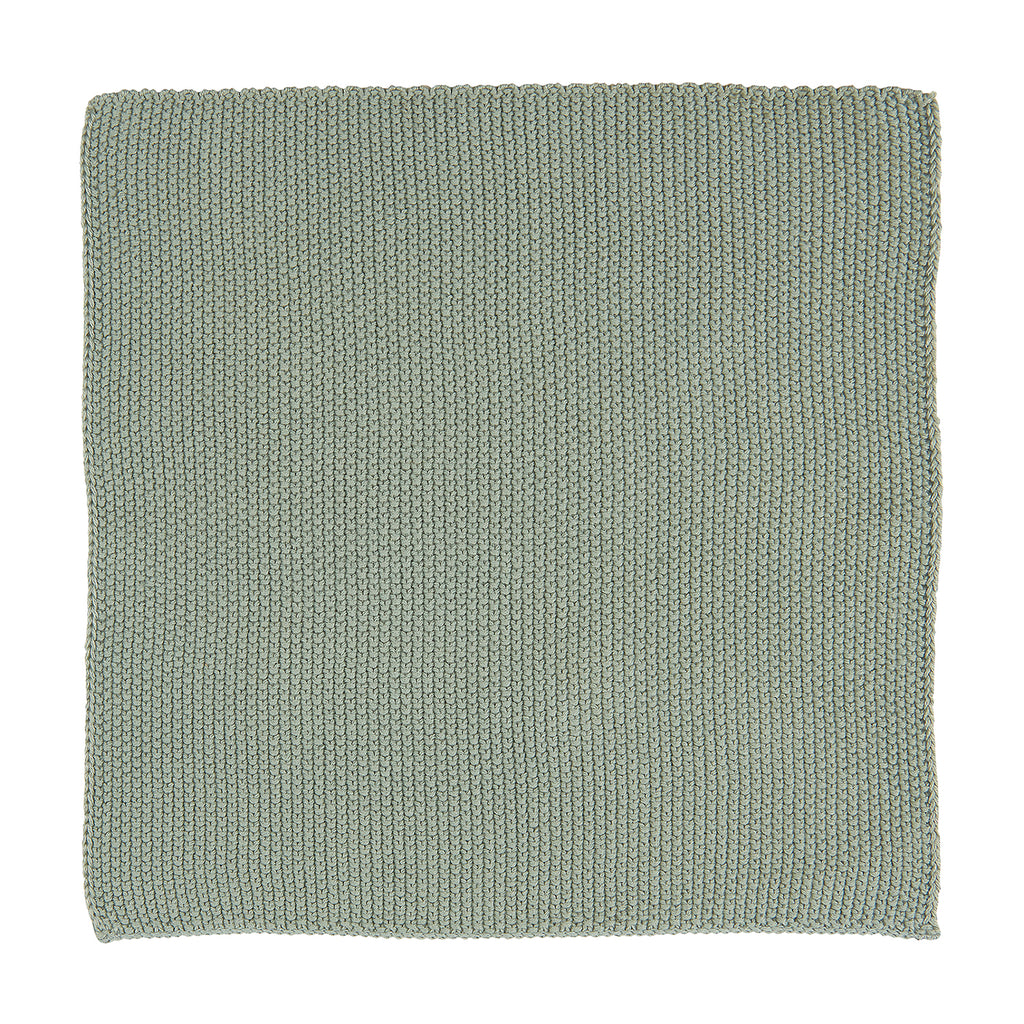 A square knitted cloth in a dusty green colour.