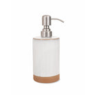 A soap dispenser with a silver metal pump, attached to a part glazed ceramic pot in Off-white with a sandy ceramic base. 